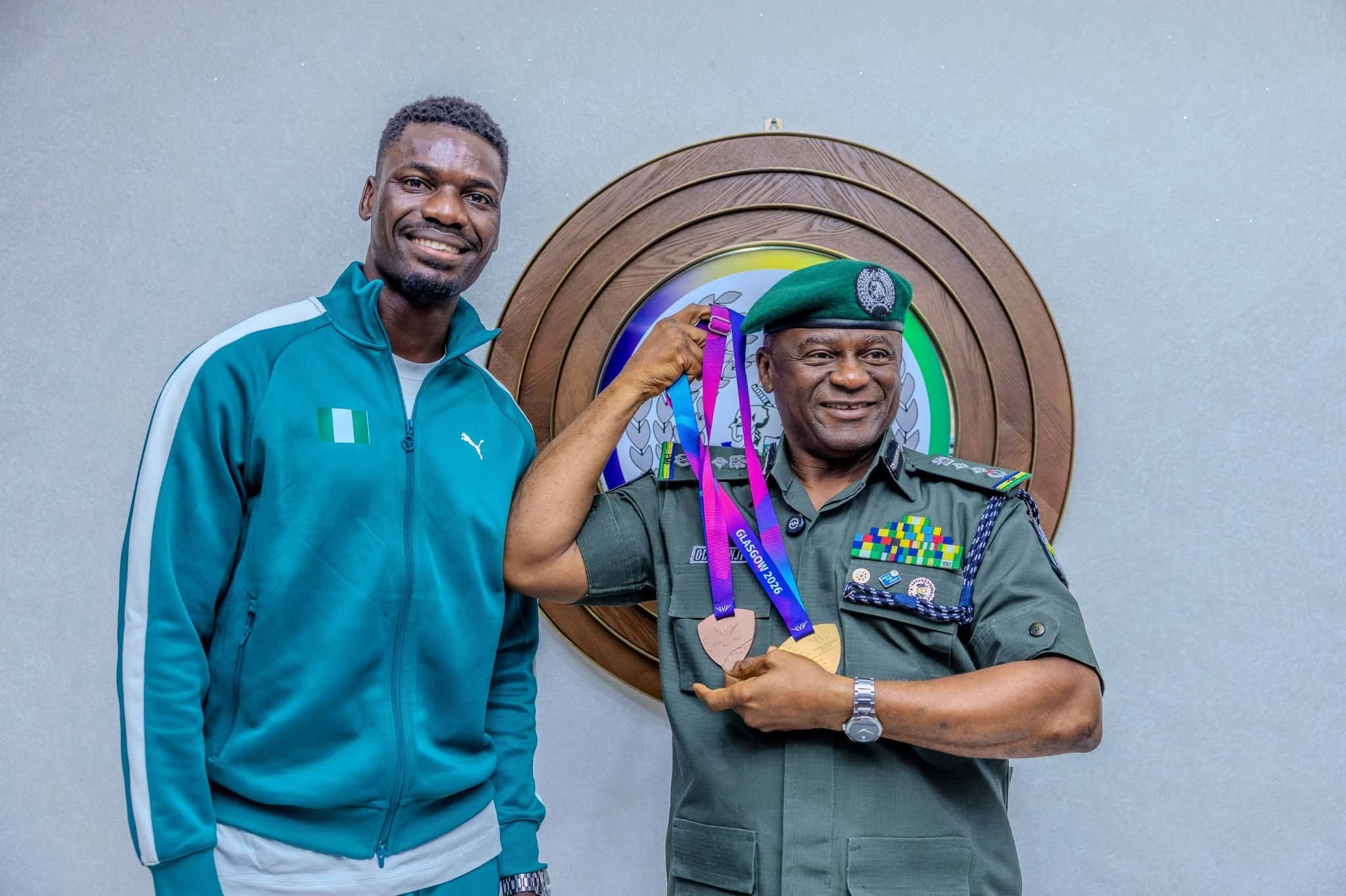 IGP Disu receives Commonwealth Games Champion Ezekiel Nathaniel